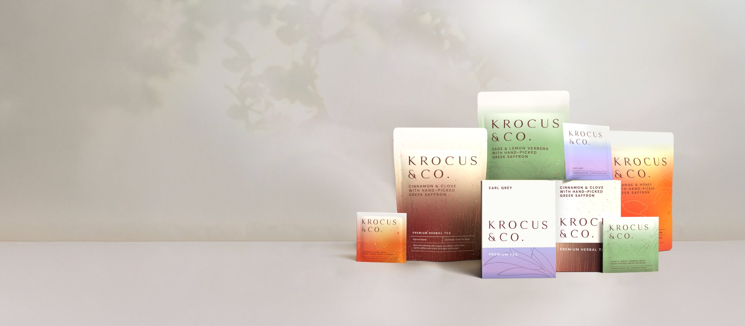 Krocus & Co. tea collection with saffron herbal blends and Earl Grey pouches and gift boxes