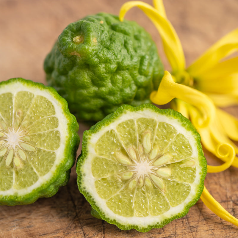 Whole and sliced bergamot citrus fruit, the signature flavour in Krocus & Co. Earl Grey